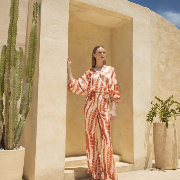 Andres Otalora luxury designer Top with bold silhouette in linen