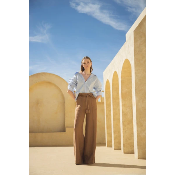 Andres Otalora luxury designer Top with bold silhouette in linen