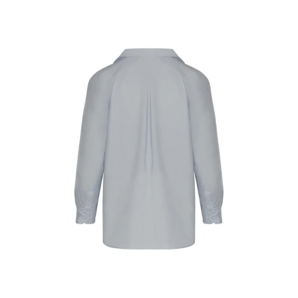 Andres Otalora luxury designer Top with bold silhouette in linen