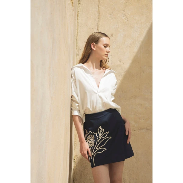 Andres Otalora luxury designer Top with bold silhouette in linen