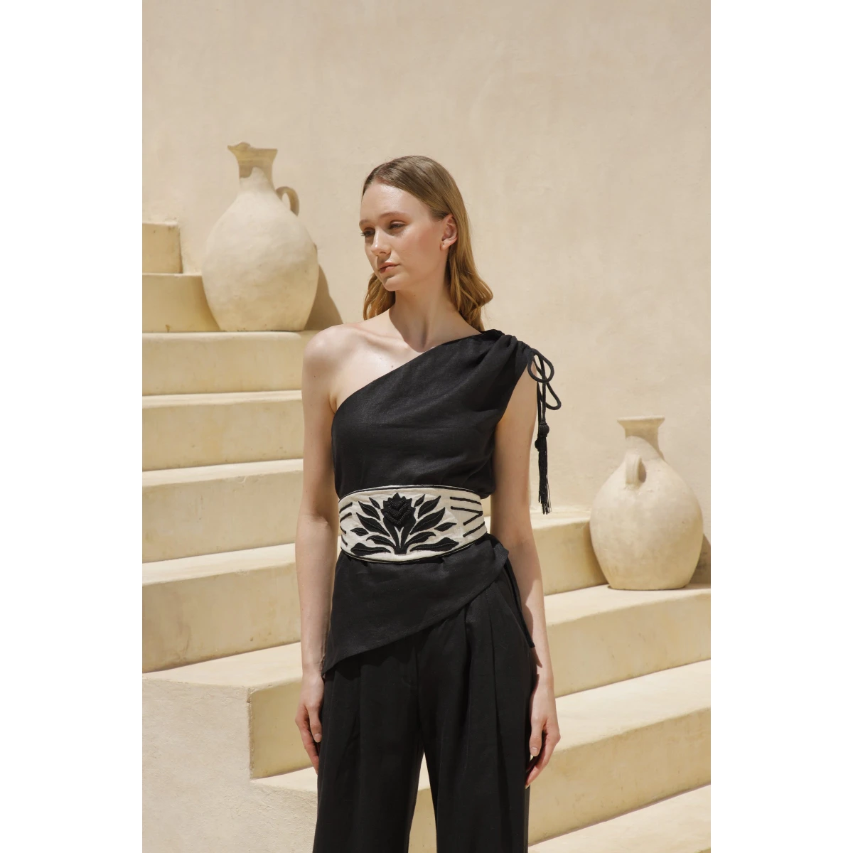 Andres Otalora luxury designer Top with bold silhouette in linen