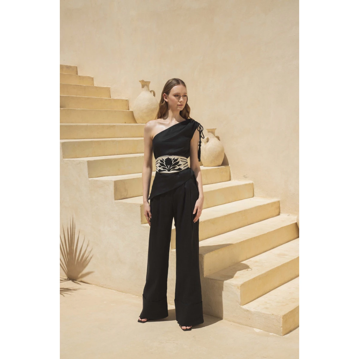 Andres Otalora luxury designer Top with bold silhouette in linen