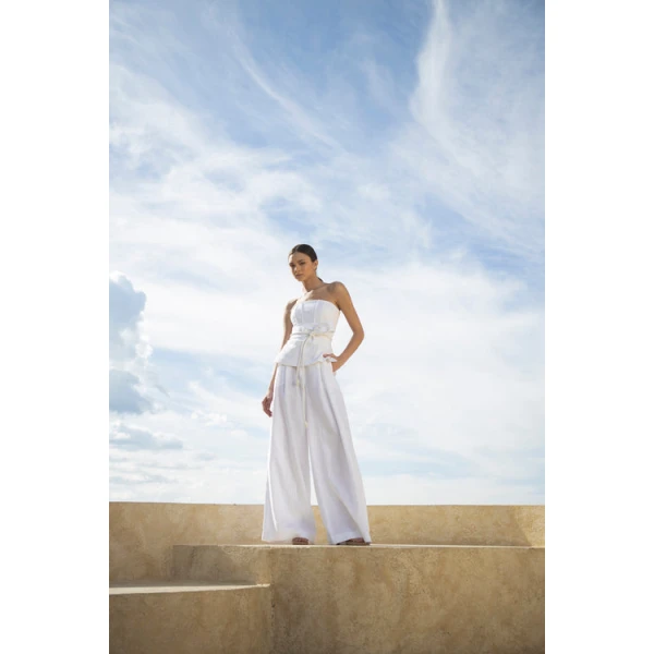 Andres Otalora luxury designer Top with bold silhouette in linen