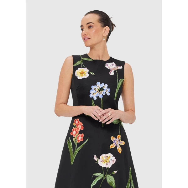 Leo Lin Blue Dresses Step into a midnight garden where vivid wildflowers are scattered across a black canopy. Bright