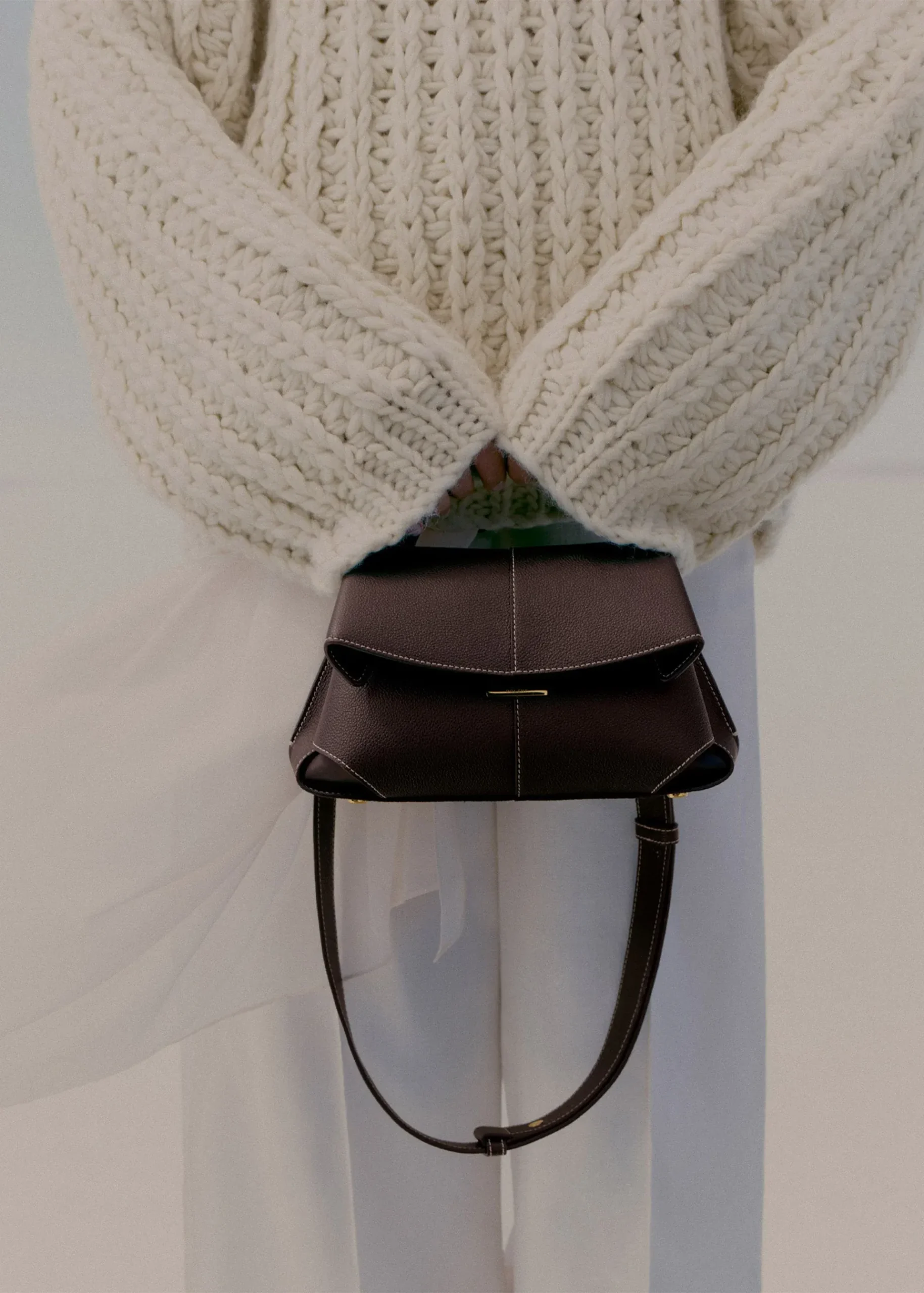 Polène bags 2025 collection featuring sculptural designs and minimalist luxury trends