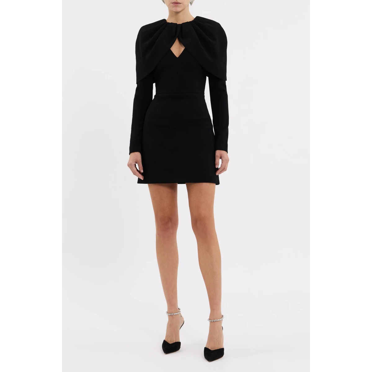the long fitted sleeves and V neckline beautifully complement the draped cape overlay