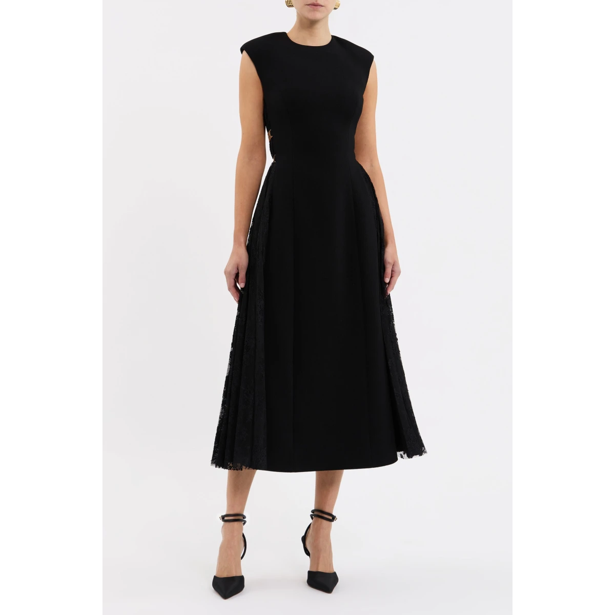 enhanced by princess seams to flatter the figure. Its circular midi skirt shapes a graceful silhouette