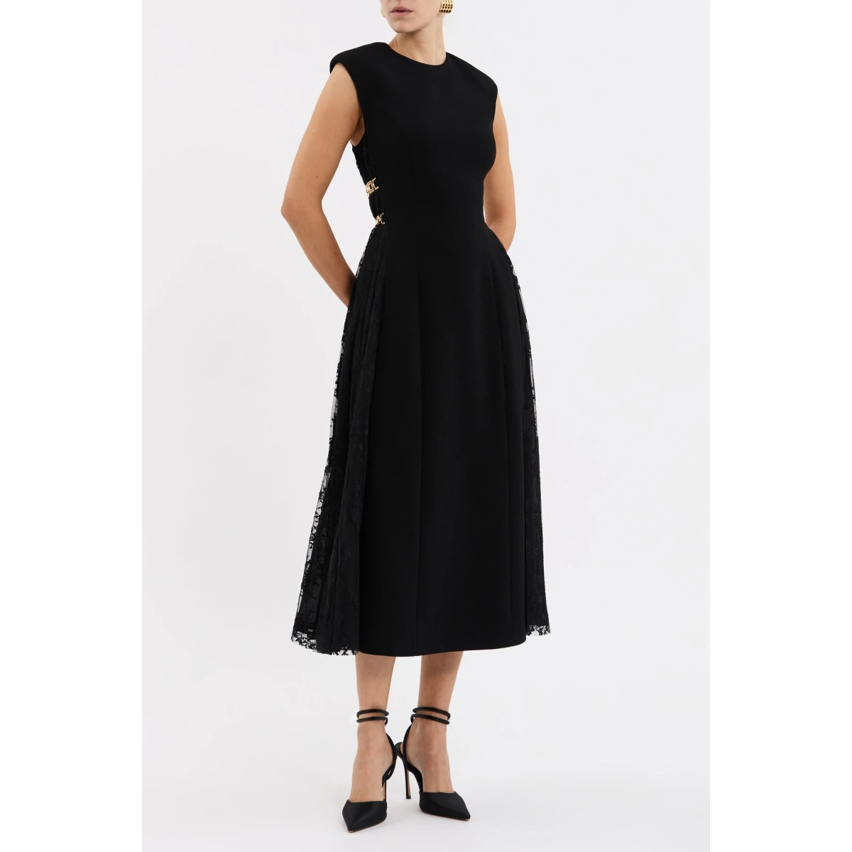 detailed with intricate lace panels and art deco chains at the sides for a touch of opulence. Complete with an invisible zip fastening at the back