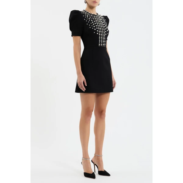 adorned with pearl trim embellishments for a touch of opulence. Cinched at the waist