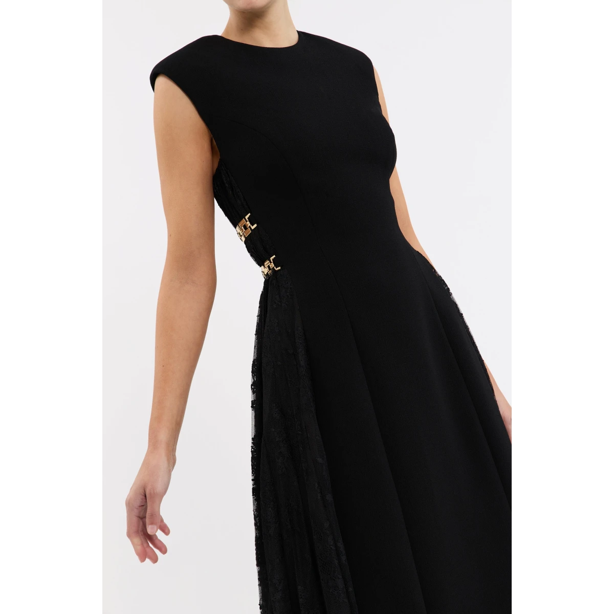 Rebecca Vallance Black Dreses The Milena Midi Dress in black radiates timeless elegance with its enchanting lace panel design. A rounded neckline and sleeveless fitted bodice sculpt a sophisticated silhouette