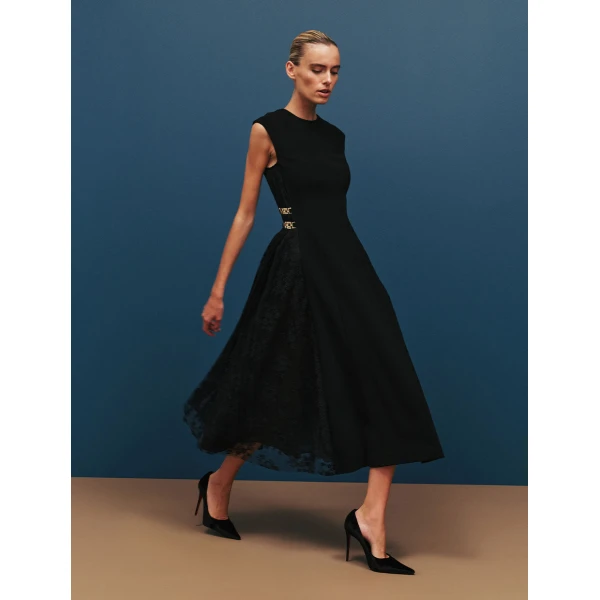 detailed with intricate lace panels and art deco chains at the sides for a touch of opulence. Complete with an invisible zip fastening at the back