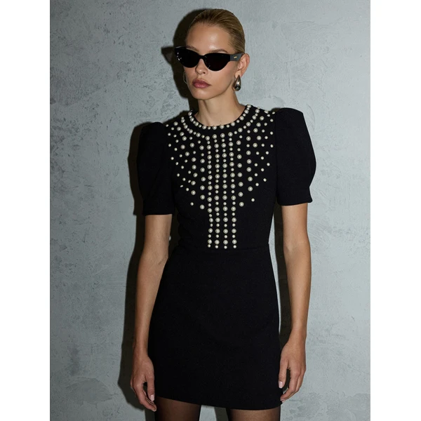 Rebecca Vallance Black Dreses The Pearly Mini Dress exudes timeless elegance and classic style. Tailored from bonded crepe