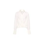 Rebecca Vallance White Tops The Noor Top in ivory embodies refined elegance and timeless sophistication. It features a chic twist-detail front