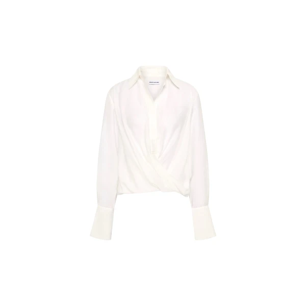 Rebecca Vallance White Tops The Noor Top in ivory embodies refined elegance and timeless sophistication. It features a chic twist-detail front