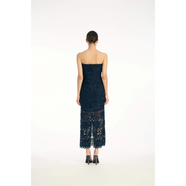 Rotate Blue from Coveti – bold silhouette in vibrant color