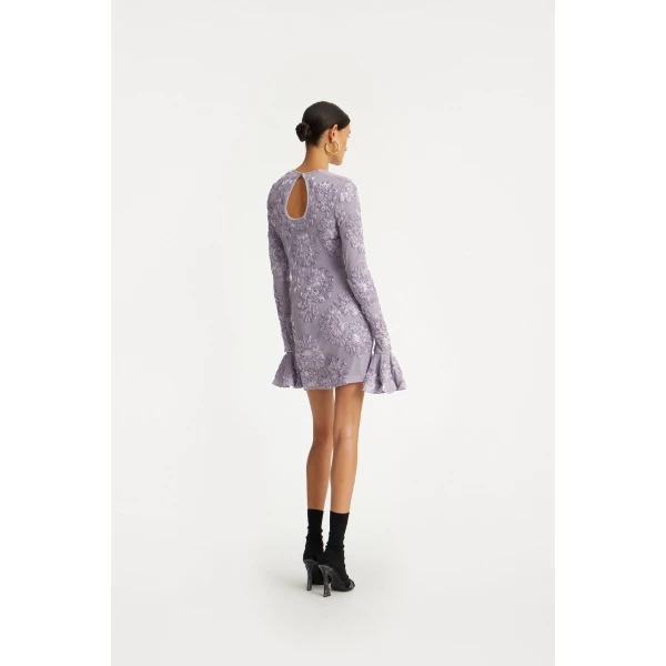 Rotate Purple from Coveti – bold silhouette in vibrant color