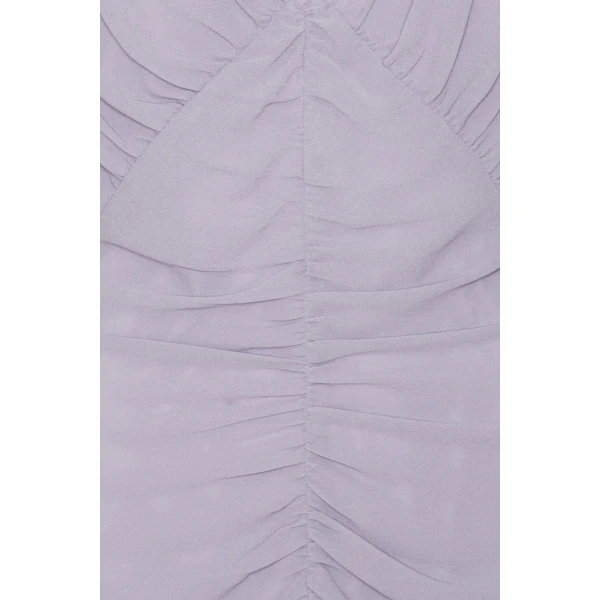 Rotate Purple from Coveti – bold silhouette in vibrant color
