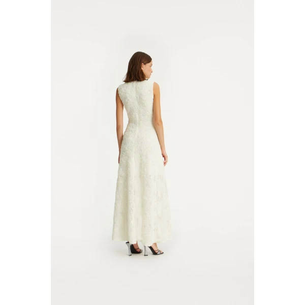 Rotate White from Coveti – bold silhouette in vibrant color