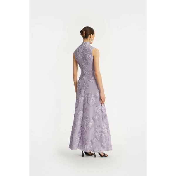 Rotate Purple from Coveti – bold silhouette in vibrant color