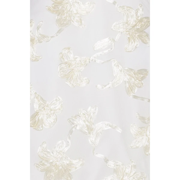 Rotate White from Coveti – bold silhouette in vibrant color