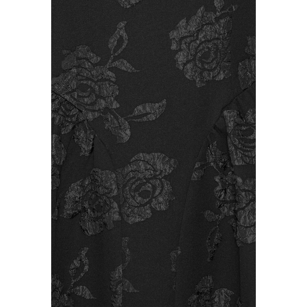 Rotate Black from Coveti – bold silhouette in vibrant color