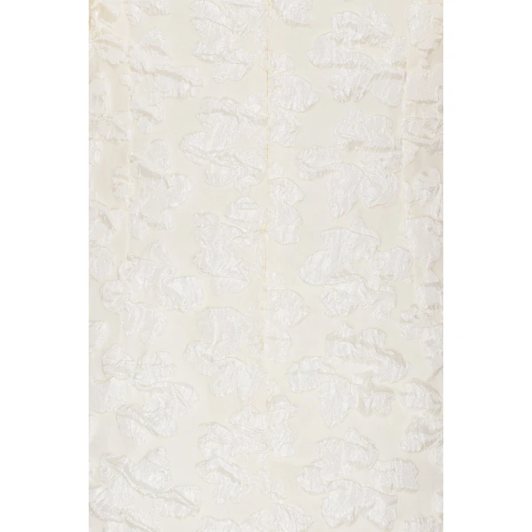 Rotate White from Coveti – bold silhouette in vibrant color