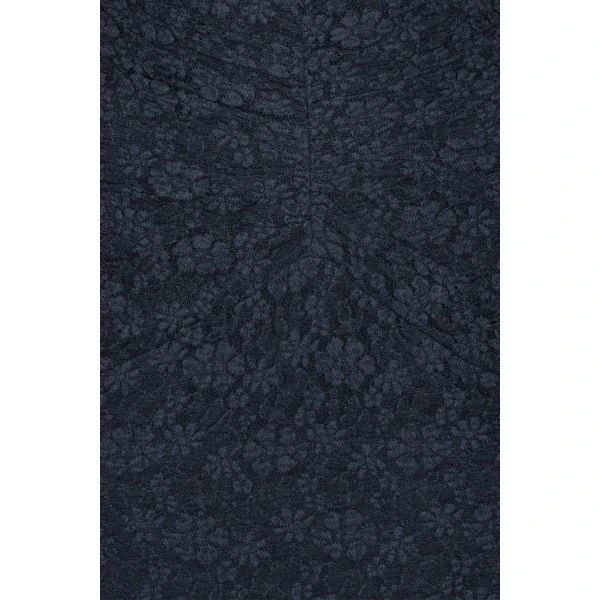 Rotate Blue from Coveti – bold silhouette in vibrant color