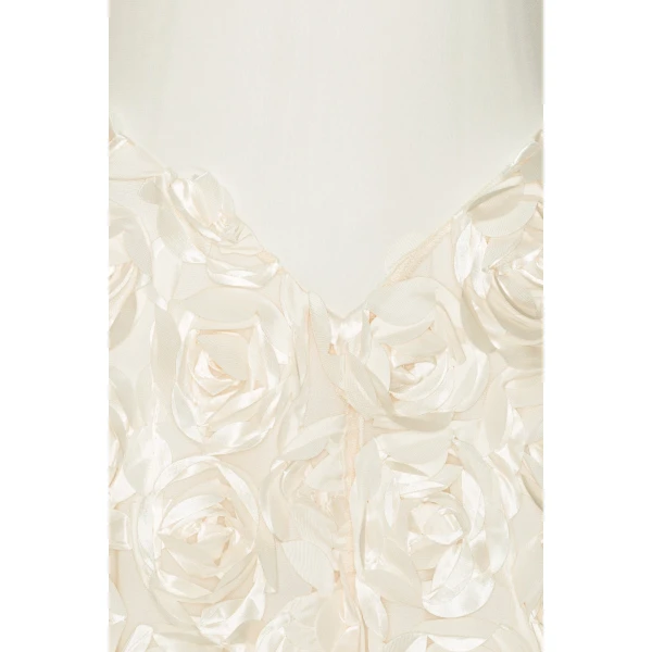 Rotate White from Coveti – bold silhouette in vibrant color