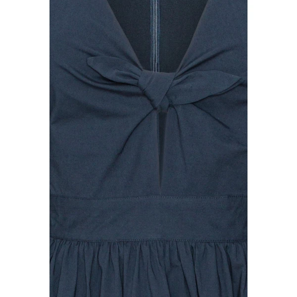 Rotate Blue from Coveti – bold silhouette in vibrant color