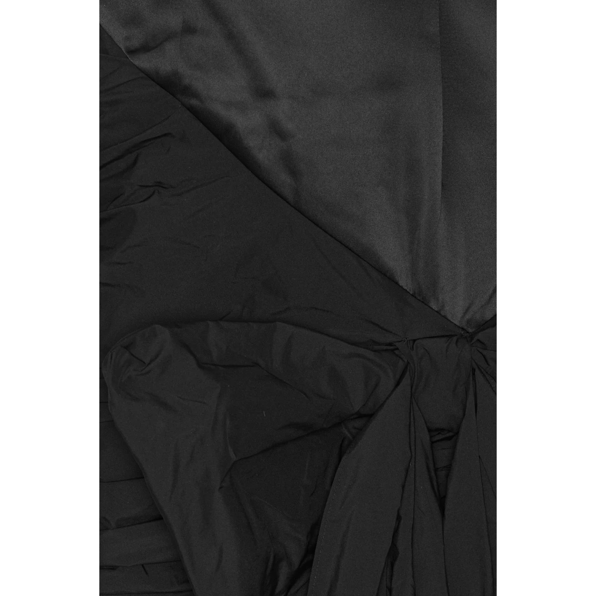 Rotate Black from Coveti – bold silhouette in vibrant color