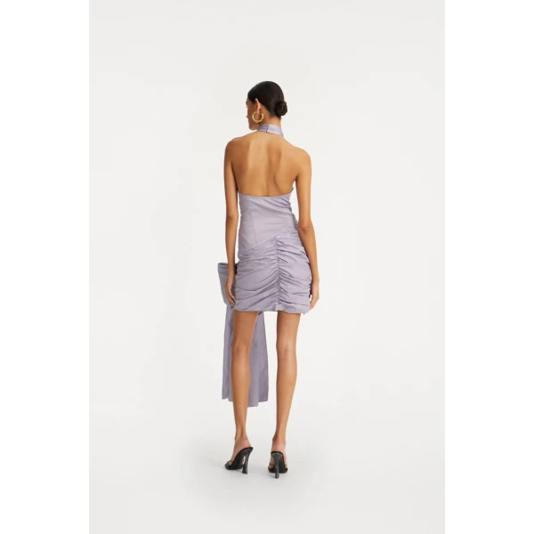 Rotate Purple from Coveti – bold silhouette in vibrant color