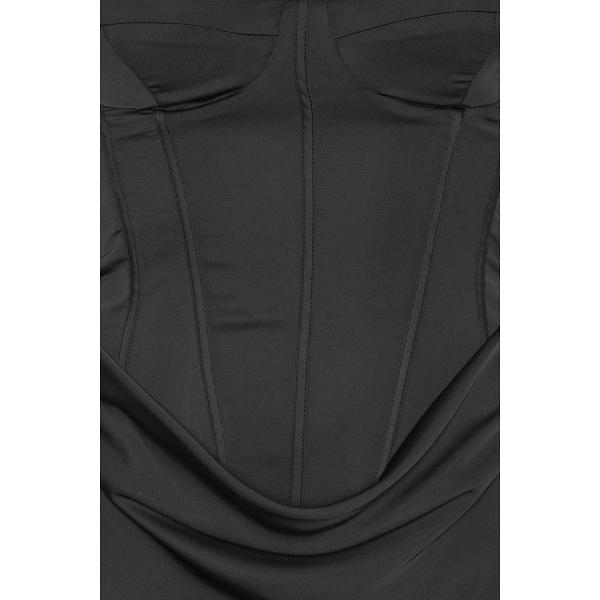 Rotate Black from Coveti – bold silhouette in vibrant color