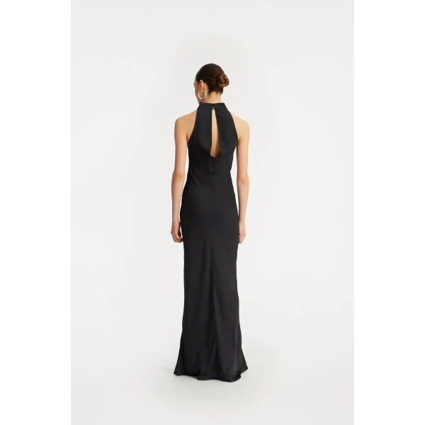 Rotate Black from Coveti – bold silhouette in vibrant color