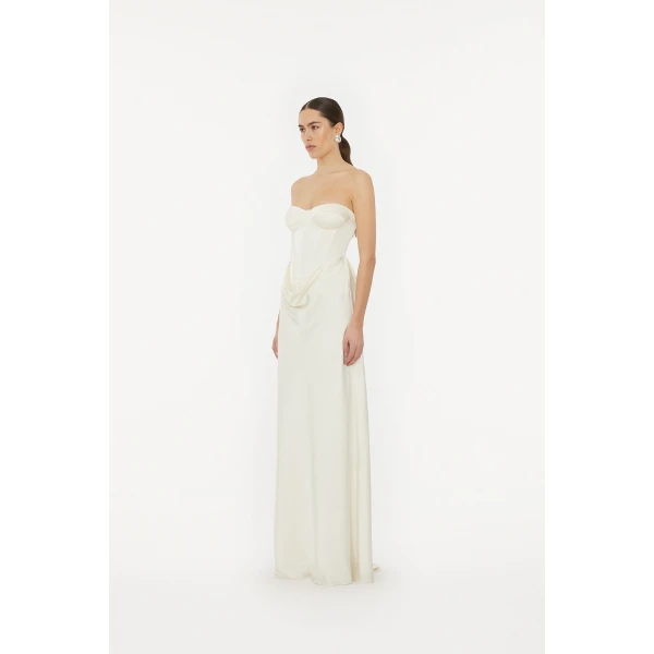 Rotate White from Coveti – bold silhouette in vibrant color