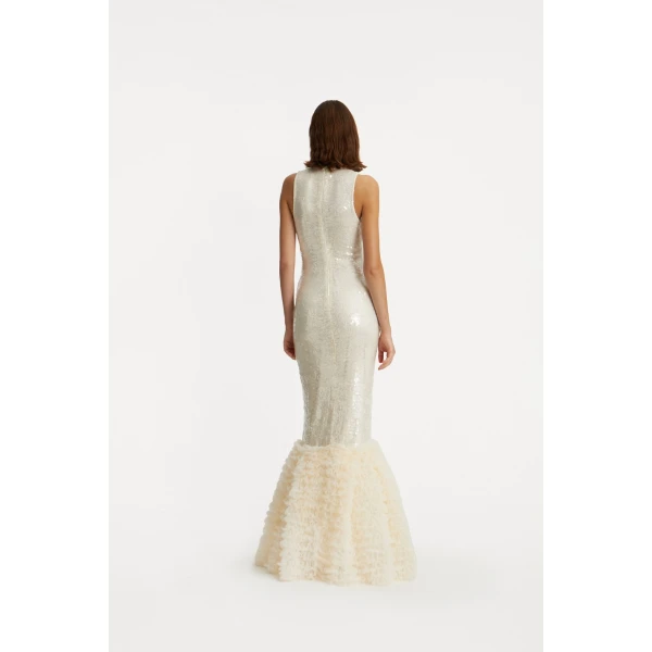 Rotate White from Coveti – bold silhouette in vibrant color