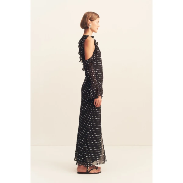 Asymmetrical neckline with ruffles