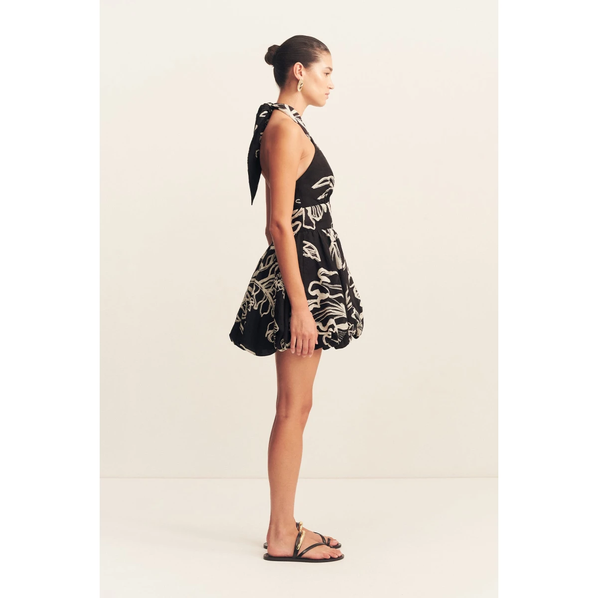 Adjustable cross front halter neckline