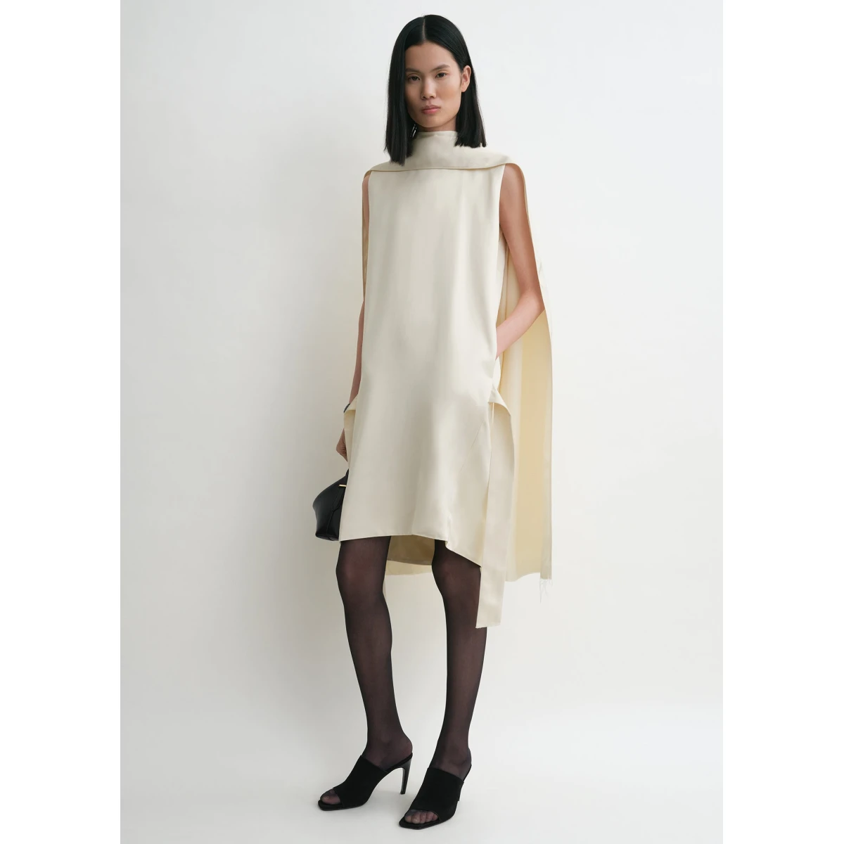 Toteme Dresses with minimalist design at Coveti