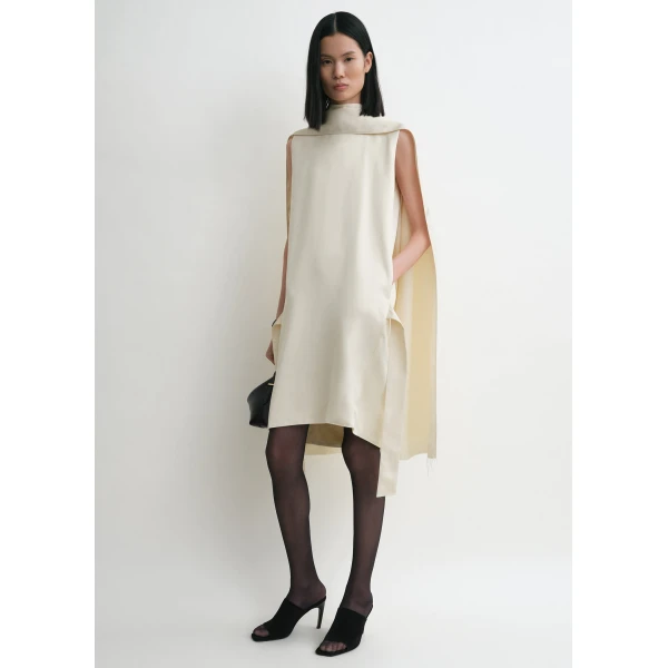 Toteme Dresses with minimalist design at Coveti