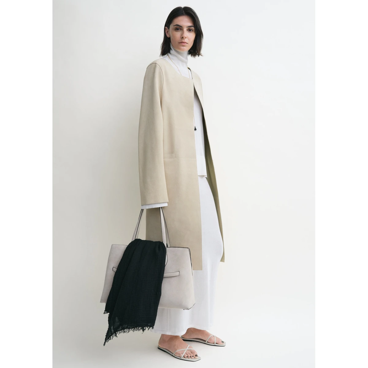 Toteme Coats with minimalist design at Coveti