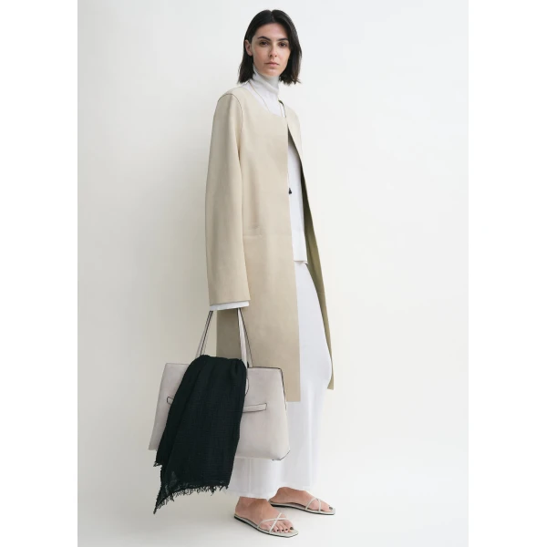Toteme Coats with minimalist design at Coveti
