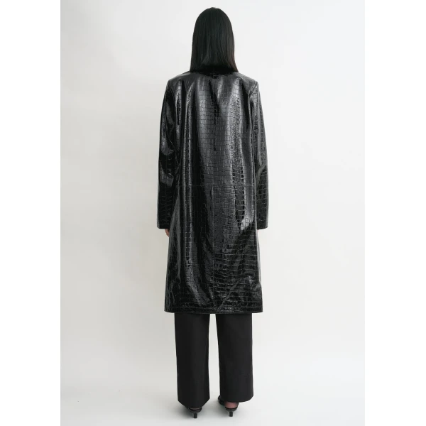Toteme Coats with minimalist design at Coveti
