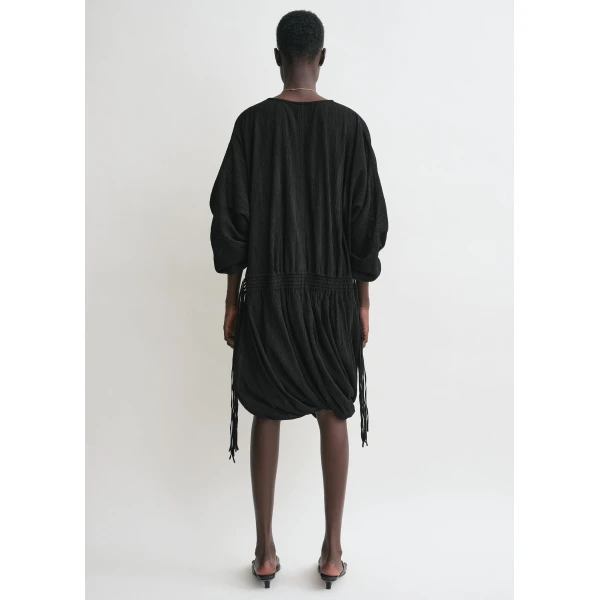 Toteme Dresses with minimalist design at Coveti