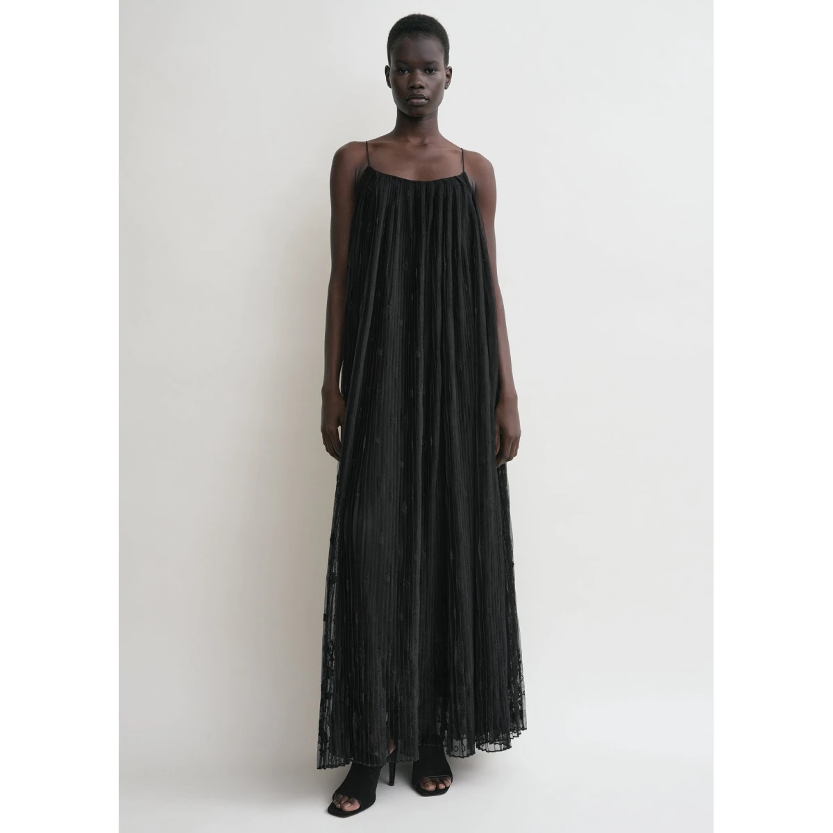 Toteme Dresses with minimalist design at Coveti