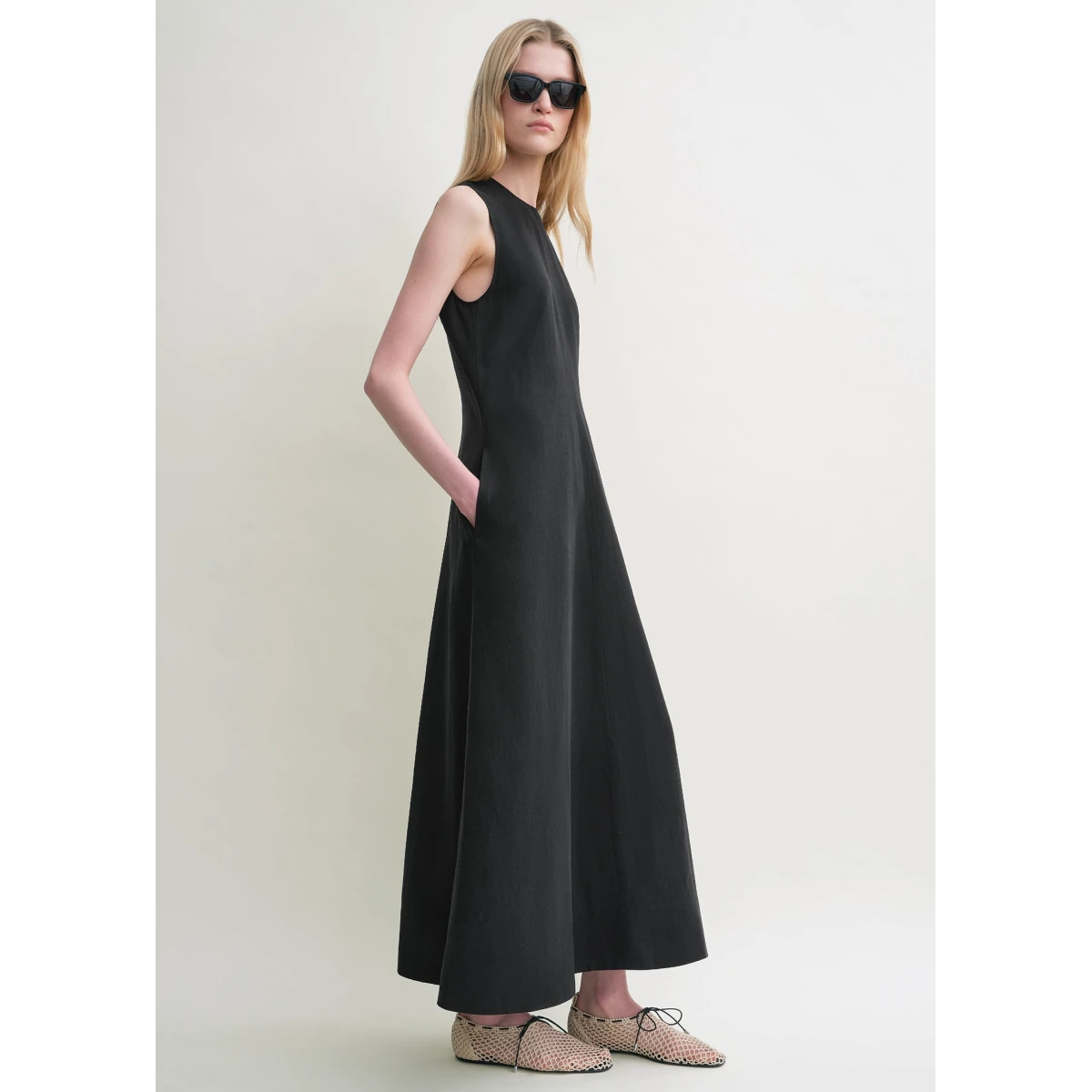Toteme Dresses with minimalist design at Coveti