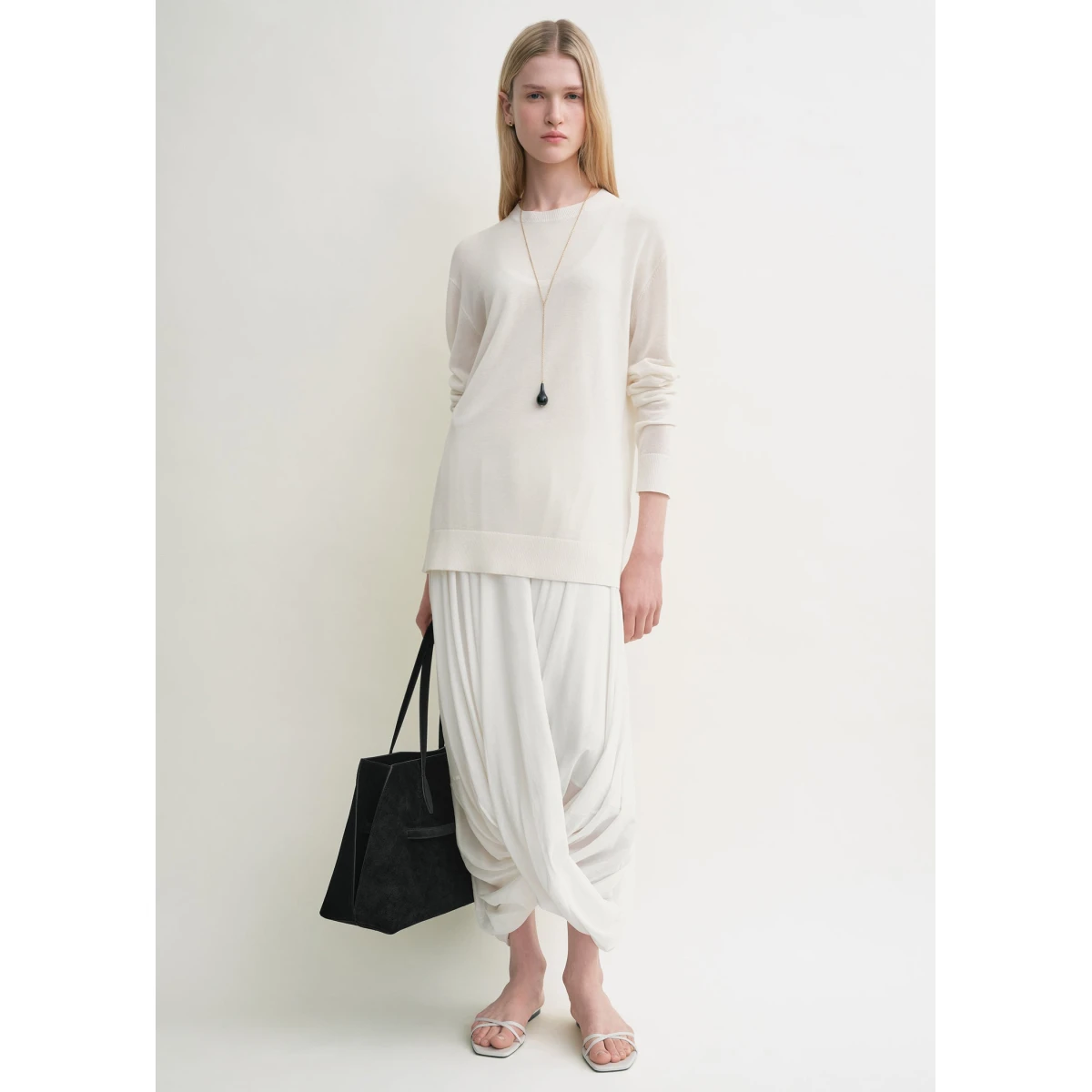 Toteme Knitwear with minimalist design at Coveti