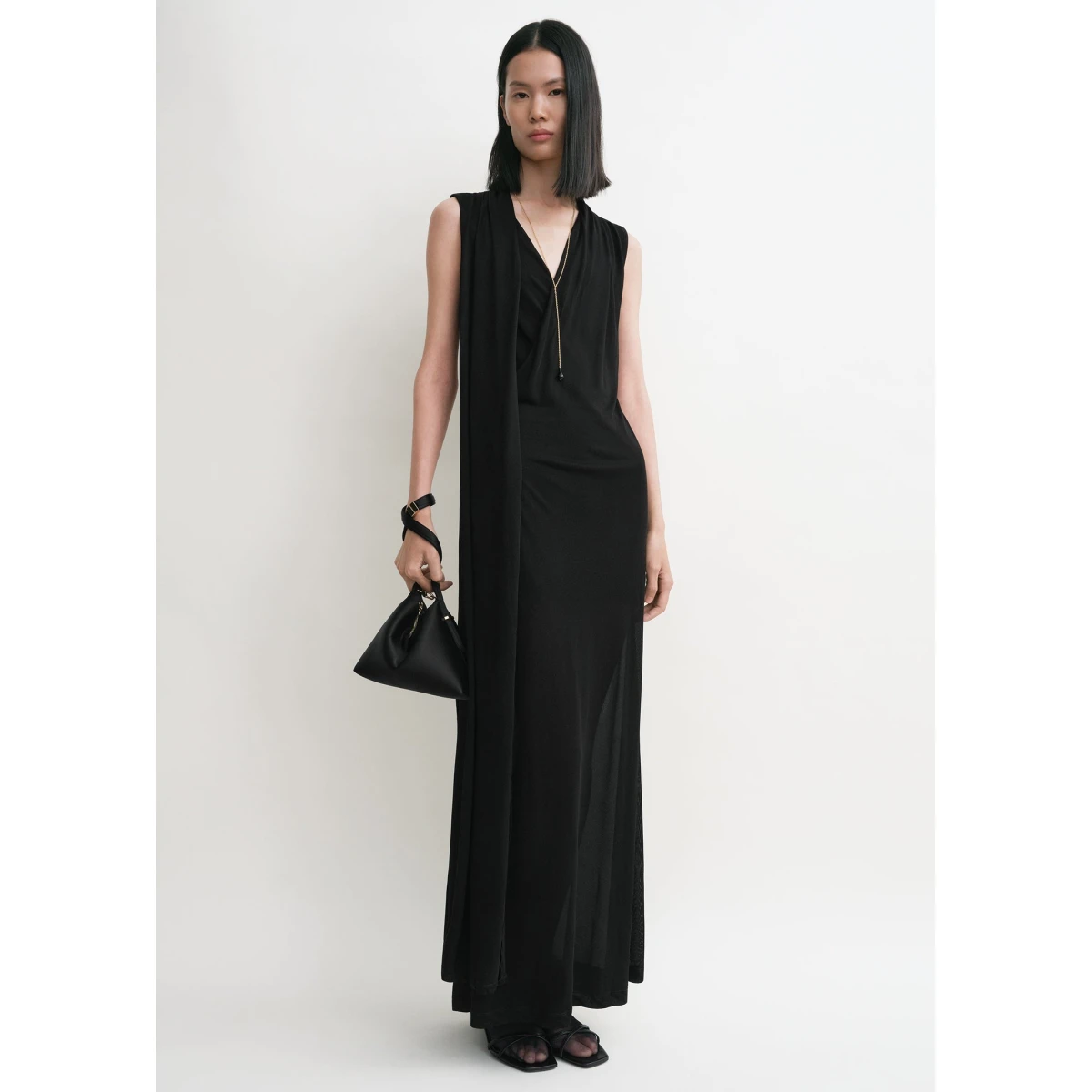 Toteme Dresses with minimalist design at Coveti