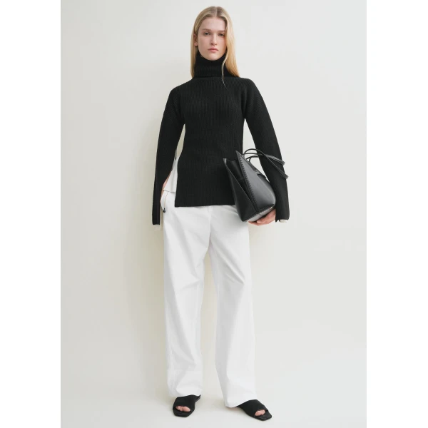 Toteme Knitwear with minimalist design at Coveti