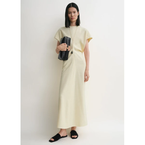 Toteme Dresses with minimalist design at Coveti