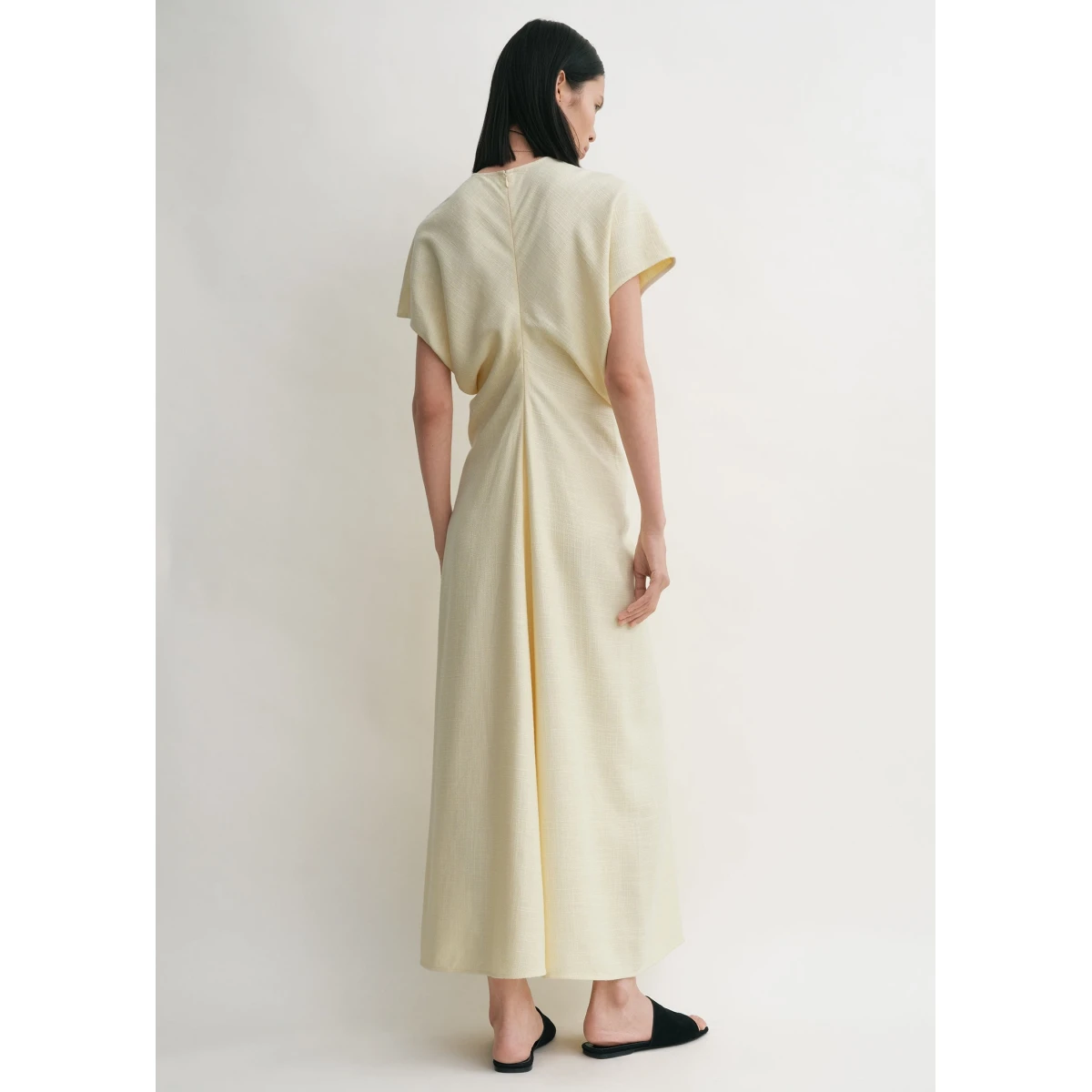 Toteme Dresses with minimalist design at Coveti